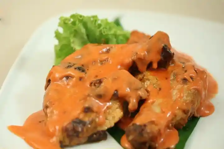 1. Grilled Chicken with Coconut Sauce